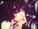 Mick Jagger studies the murder footage in Gimme Shelter - frame enlargement from the author's 16mm print